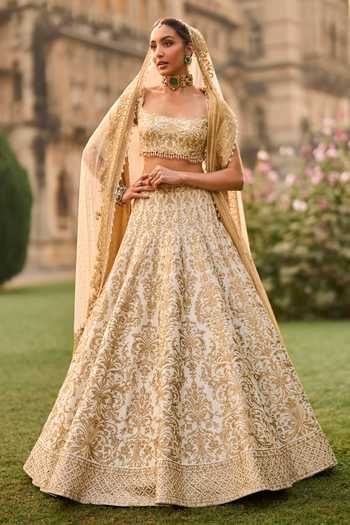 Buy_Seema Gujral_Ivory Silk, Net Embroidery, Sequins, Beads, Zari, Tassels, Bridal Lehenga Set _at_Aza_Fashions