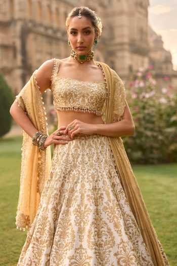 Shop_Seema Gujral_Ivory Silk, Net Embroidery, Sequins, Beads, Zari, Tassels, Bridal Lehenga Set _Online_at_Aza_Fashions
