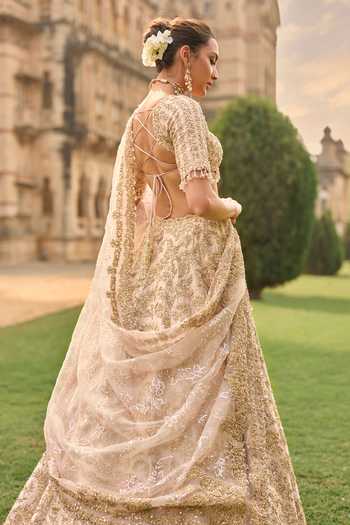 Seema Gujral_Peach Silk, Net Sequins, Beads, Pearls, Raw Embroidered Bridal Lehenga Set _Online_at_Aza_Fashions
