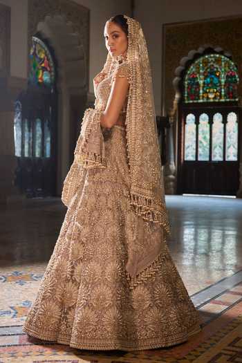 Seema Gujral_Gold Net Sequins, Beads, Pearls, Tassels Scoop Embroidered Bridal Lehenga Set _Online_at_Aza_Fashions