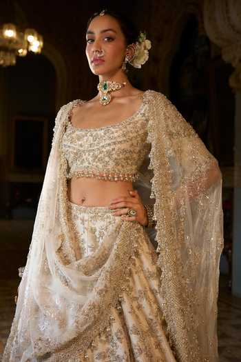 Shop_Seema Gujral_Beige Net Sequins, Pearls, Zari, Crystals, Zardozi Work Bridal Lehenga Set _Online_at_Aza_Fashions