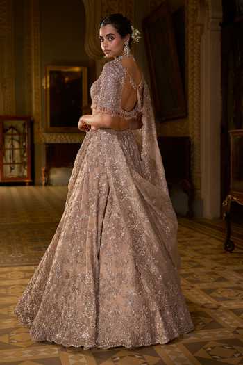 Seema Gujral_Rose Gold Net Sequins, Beads, Crystals, Tassels Bugle Work Bridal Lehenga Set _Online_at_Aza_Fashions