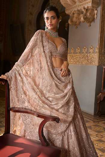 Shop_Seema Gujral_Rose Gold Net Sequins, Beads, Crystals, Tassels Bugle Work Bridal Lehenga Set _Online_at_Aza_Fashions