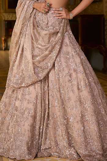 Seema Gujral_Rose Gold Net Sequins, Beads, Crystals, Tassels Bugle Work Bridal Lehenga Set _at_Aza_Fashions