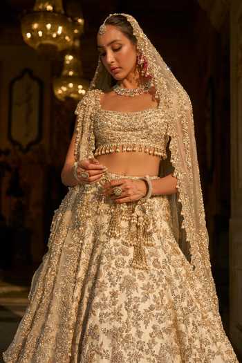 Buy_Seema Gujral_Ivory Net Sequins, Pearls, Zari, Crystals, Floral Embroidered Bridal Lehenga Set _Online_at_Aza_Fashions