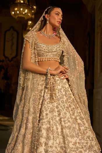 Seema Gujral_Ivory Net Sequins, Pearls, Zari, Crystals, Floral Embroidered Bridal Lehenga Set _at_Aza_Fashions