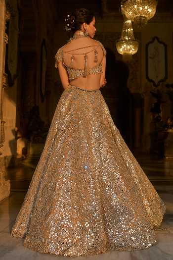 Shop_Seema Gujral_Gold Organza, Tissue Mirrors, Tassels Sweetheart Neck Work Bridal Lehenga Set _at_Aza_Fashions
