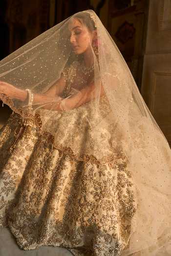 Shop_Seema Gujral_Gold Plated Sequins, Beads Ivory Kaliras - Set Of 2 _Online_at_Aza_Fashions