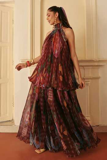 Buy_ZiP by Payal & Zinal_Wine Halter Neck Imli Glam Flowy Top And Pleated Skirt Set _at_Aza_Fashions