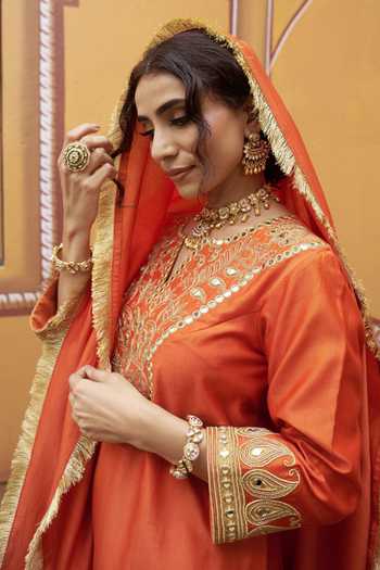 Thetaa_Orange Silk, Cotton Embroidery, Zari, Mirrors V-neck, Cutdana Hand Kurta Set _at_Aza_Fashions
