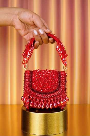 Buy_House Of Kosha_Gold Beads, Crystals, Tassels Josy Suede Embellished Mini Bag _at_Aza_Fashions