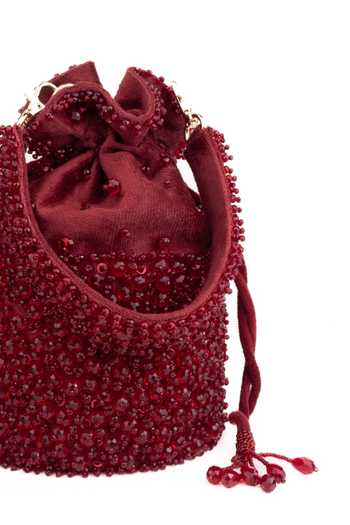 Shop_House Of Kosha_Maroon Beads, Crystals, Tassels Zaria Embellished Bucket Bag _Online_at_Aza_Fashions