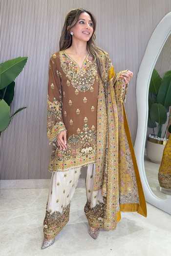 Surkh Syahi_Gold Crepe Stones V-neck Ornate Pattern Kurta Salwar Set _at_Aza_Fashions