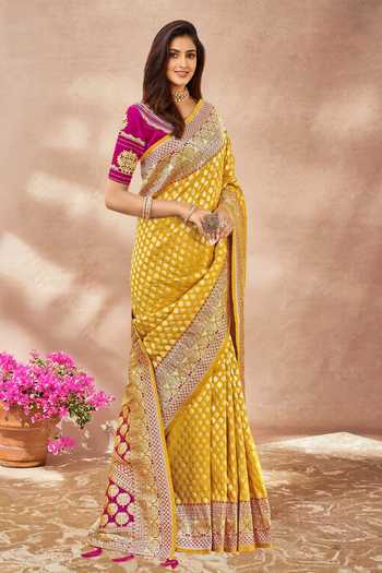 Shop_Khwaab By Sanjana Lakhani_Yellow Georgette, Silk Embroidery Round Neck Floral Butti Woven Saree And Blouse _Online_at_Aza_Fashions