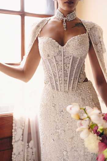 Mishru_Ivory Tulle Embroidery, Zarina Tonal Precious Flowers Corset And Skirt Set _at_Aza_Fashions