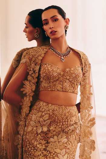 Buy_Mishru_Gold Tulle Embroidery, Sequins, Zari, Stones Josie Cape Lehenga Set _Online_at_Aza_Fashions