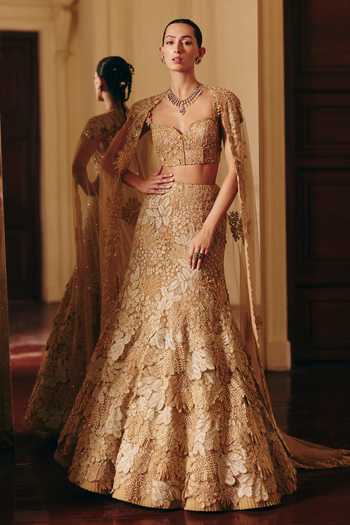 Buy_Mishru_Gold Tulle Embroidery, Sequins, Zari, Stones Josie Cape Lehenga Set _at_Aza_Fashions