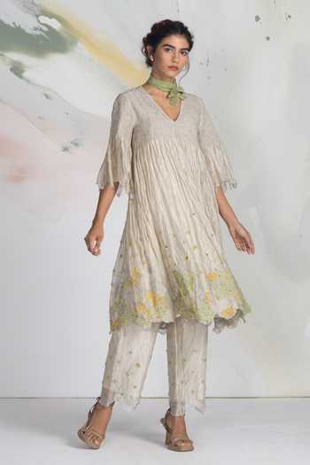 Buy_Ilk_Ivory Silk, Tissue Embroidery V-neck Smocked Speckle Dress _at_Aza_Fashions