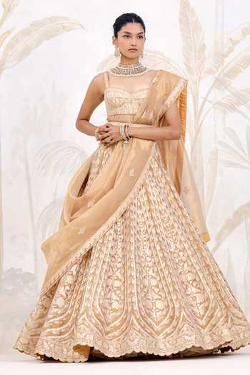 Shyam Narayan Prasad_Gold Silk, Organza, Tissue Gota Patti, Tassels Embroidered Lehenga Set _Online_at_Aza_Fashions