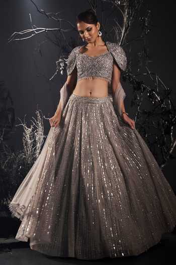 Buy_Shivani Awasty_Silver Net Embroidery, Sequins, Crystals Sweetheart Neck Embellished Lehenga Set _at_Aza_Fashions