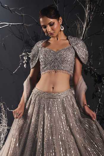Buy_Shivani Awasty_Silver Net Embroidery, Sequins, Crystals Sweetheart Neck Embellished Lehenga Set _Online_at_Aza_Fashions