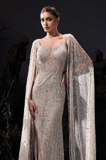 Shivani Awasty_Silver Net Sequins, Beads Sweetheart Neck Draped Sleeve Gown _Online_at_Aza_Fashions