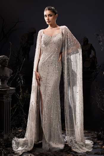 Buy_Shivani Awasty_Silver Net Sequins, Beads Sweetheart Neck Draped Sleeve Gown _at_Aza_Fashions