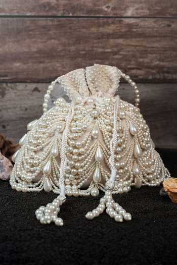 Buy_Nayaab By Sonia_Off White Pearls, Tassels Work Velvet Potli Bag _at_Aza_Fashions