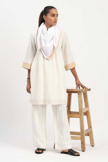 Buy_ABRAHAM AND THAKORE_Ivory Linen Round Neck Pleated Tunic _at_Aza_Fashions