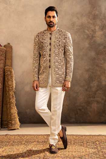 Buy_Millionaire_Off White Georgette Embroidery Motif Bandhgala With Trouser _at_Aza_Fashions