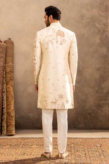 Shop_Millionaire_Cream Silk Embroidery, Zari Floral Raw Sherwani Set _at_Aza_Fashions