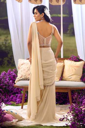 Aariyana Couture_Ivory Lycra, Net Sequins, Beads Sweetheart Neck Pre-draped Saree With Corset _Online_at_Aza_Fashions