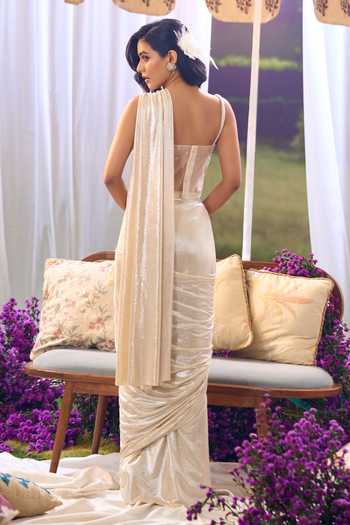 Aariyana Couture_Ivory Lycra, Net Embroidery, Sequins, Beads Pre-draped Saree With Corset _Online_at_Aza_Fashions