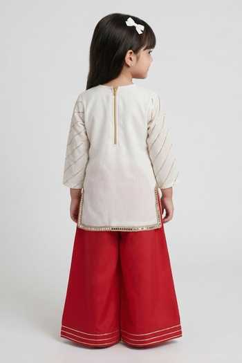 Shop_Petite Pomme_White Crepe, Net Embroidery, Zari Placement Kurta Palazzo Set _at_Aza_Fashions