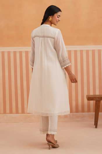 Shop_OMI_Pink Chanderi, Cotton Satin Embroidery Mandarin Collar, Yes Thread Kurta Set _at_Aza_Fashions