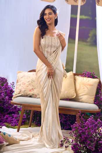 Shop_Aariyana Couture_Ivory Lycra, Net Embroidery, Sequins, Beads Pre-draped Saree With Corset _at_Aza_Fashions