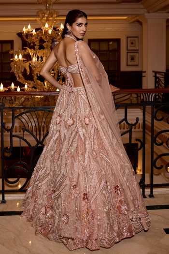 Shop_Opus Atelier_Peach Satin, Net, Viscose, Tulle Halter Neck Harper Embroidered Lehenga Set _at_Aza_Fashions