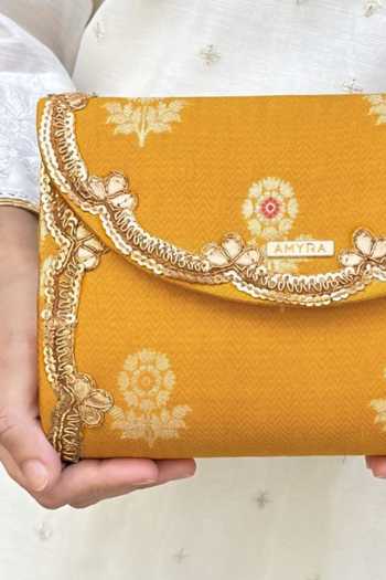 Buy_AMYRA_Yellow Bahaar Pure Silk Flapover Clutch _Online_at_Aza_Fashions