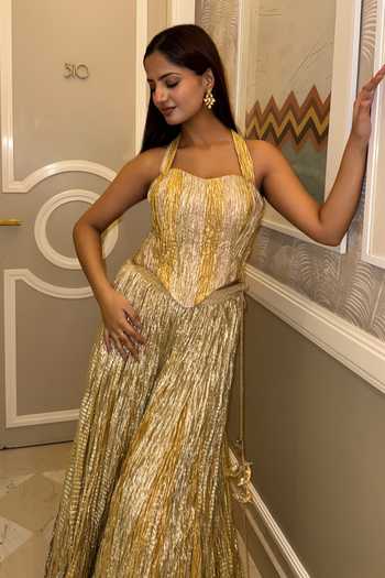 Shop_Etasha By Asha Jain_Gold Tissue Halter Neck Textured Metallic Corset And Palazzo Set _at_Aza_Fashions