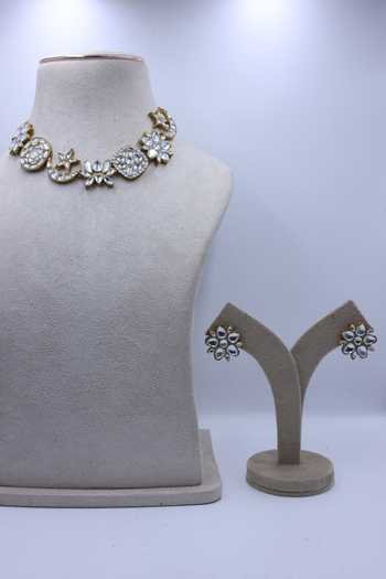 Shop_Moh-Maya By Disha Khatri_Gold Plated Kundan Polki Moon Star Lotus Choker Set _at_Aza_Fashions