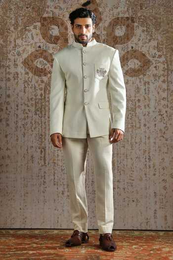Buy_Asuka_Ivory Suiting Embroidery Royal Crest Bandhgala And Trouser Set _at_Aza_Fashions