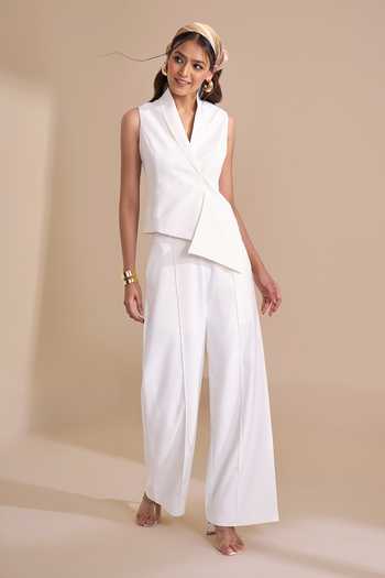 Buy_Naintara Bajaj_Ivory Lycra V-neck Asymmetric Structured Waistcoat _at_Aza_Fashions