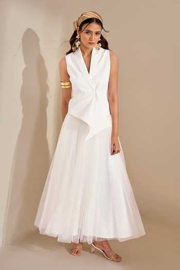 Naintara Bajaj_Ivory Lycra, Net Shawl Neck Structured Waistcoat And Flared Skirt Set _at_Aza_Fashions