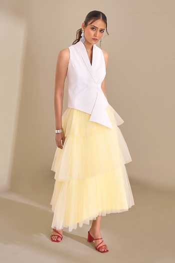Naintara Bajaj_Ivory Lycra, Net V-neck Soft Contrast Waistcoat And Layered Skirt Set _at_Aza_Fashions