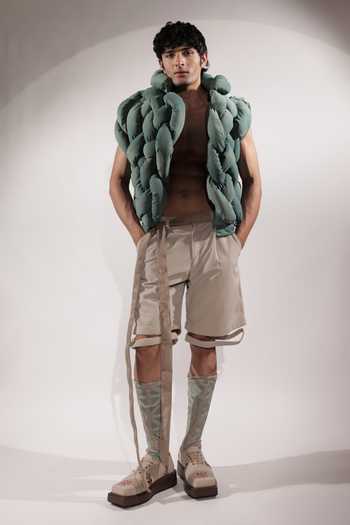 Buy_Jubinav Chadha_Beige Suede Levitating Effect Tailored Shorts _at_Aza_Fashions