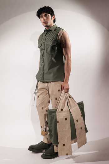 Shop_Jubinav Chadha_Green Leatherette Weaving Detail Sleeveless Jacket _Online_at_Aza_Fashions