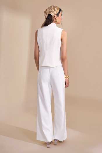 Naintara Bajaj_Ivory Lycra V-neck Asymmetric Structured Waistcoat _Online_at_Aza_Fashions