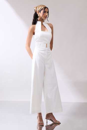 Shop_Naintara Bajaj_Ivory High Collar Jumpsuit And Buckle Belt Set _Online_at_Aza_Fashions