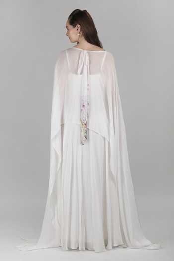 Shop_Mandira Wirk_Ivory Chiffon, Viscose Boat Neck Palm Sheer Cape And Gown _at_Aza_Fashions