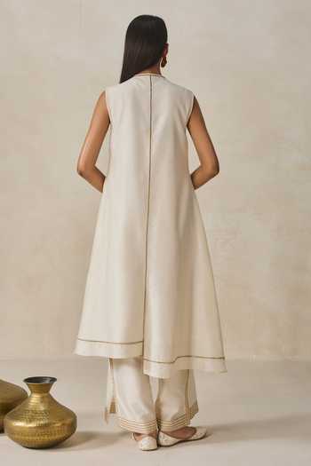 Shop_Nitika Gujral_Ivory Chanderi Applique V-neck, Yes Kurta With Palazzo _at_Aza_Fashions